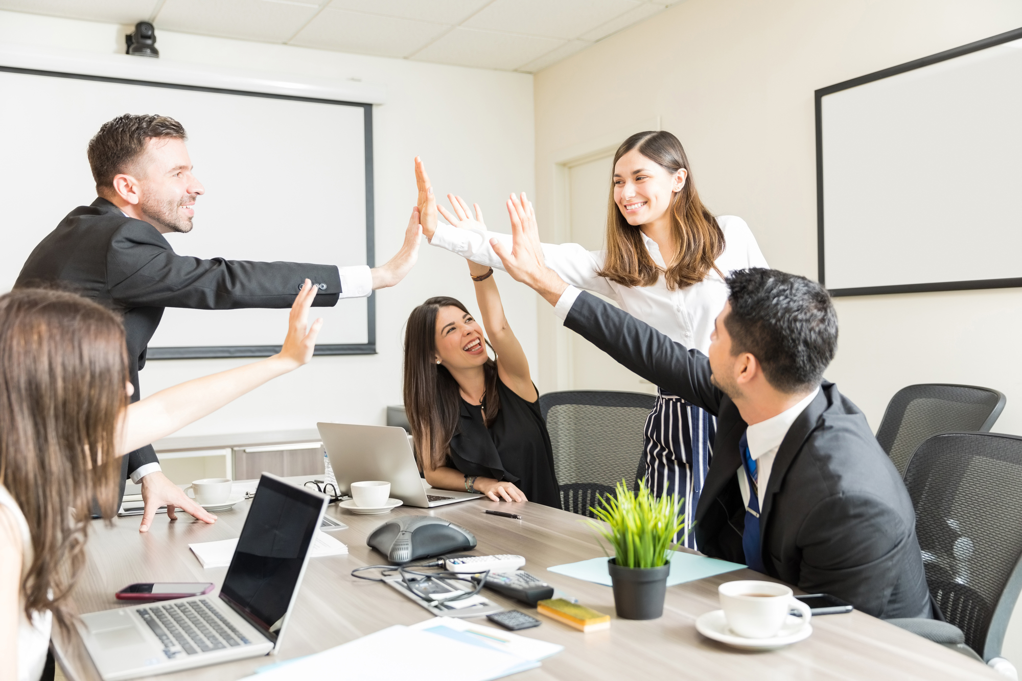 Proud Professionals Celebrating New Business Deal